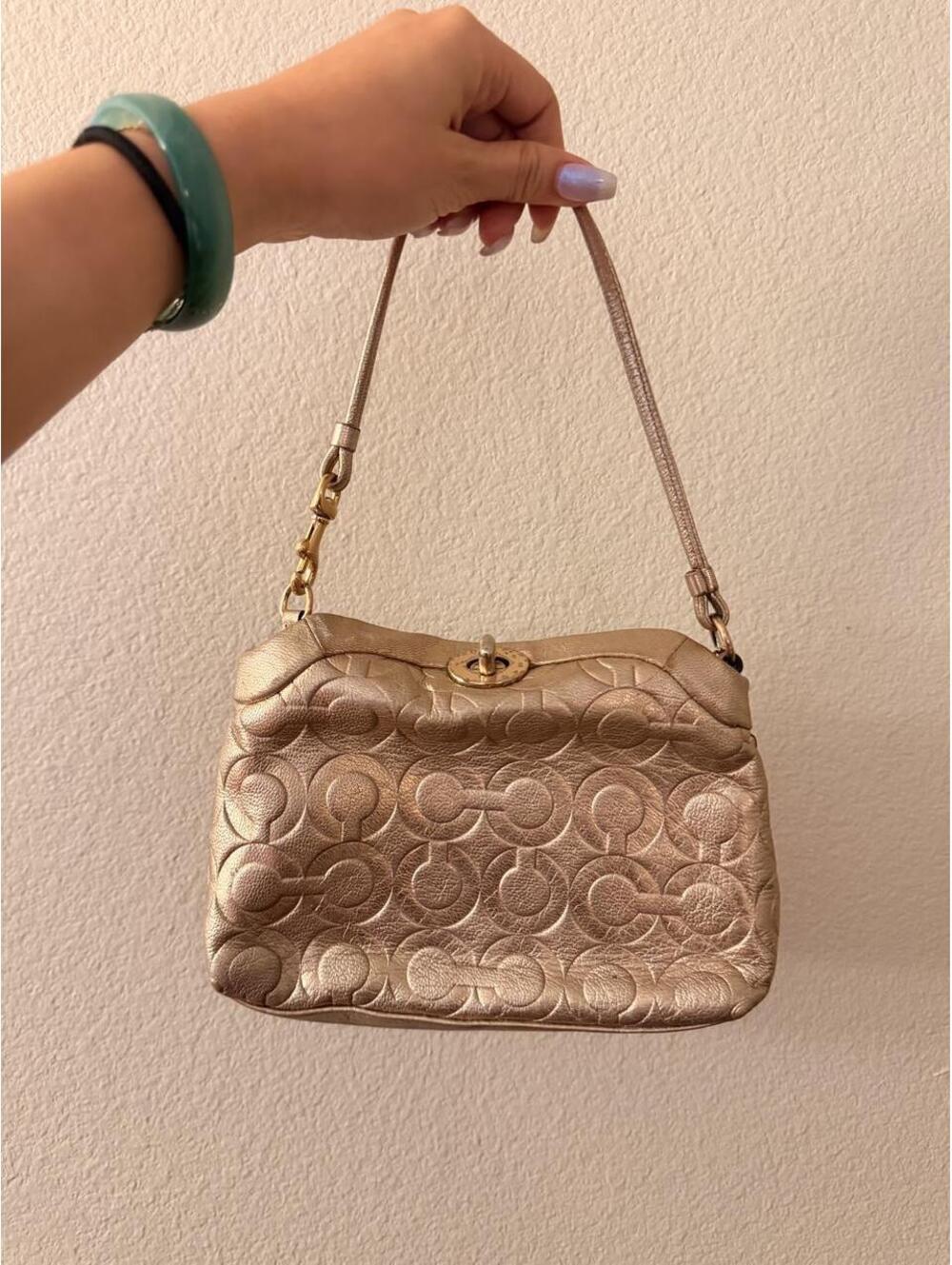 Vintage Rose Gold Coach Turnlock Wristlet